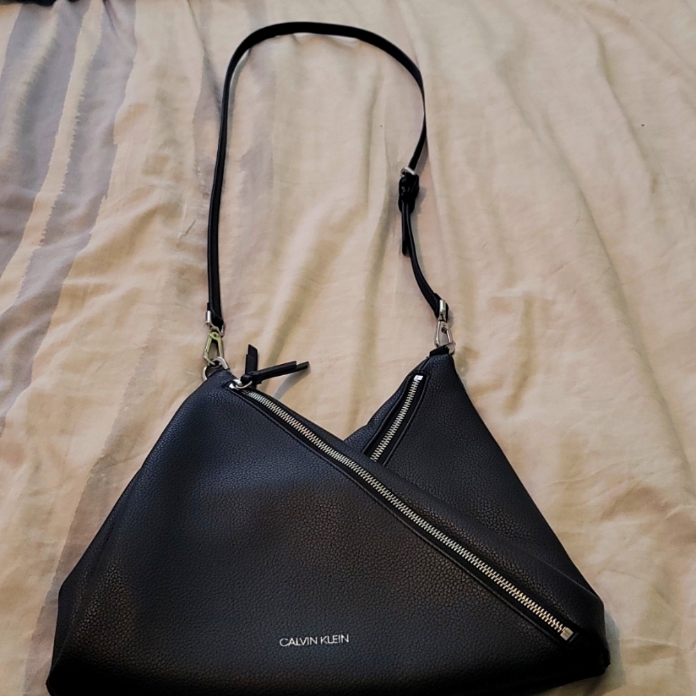 Cross body black Calvin Klein purse.